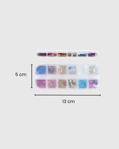 Caja con lentejuelas brillantes en forma de mariposa