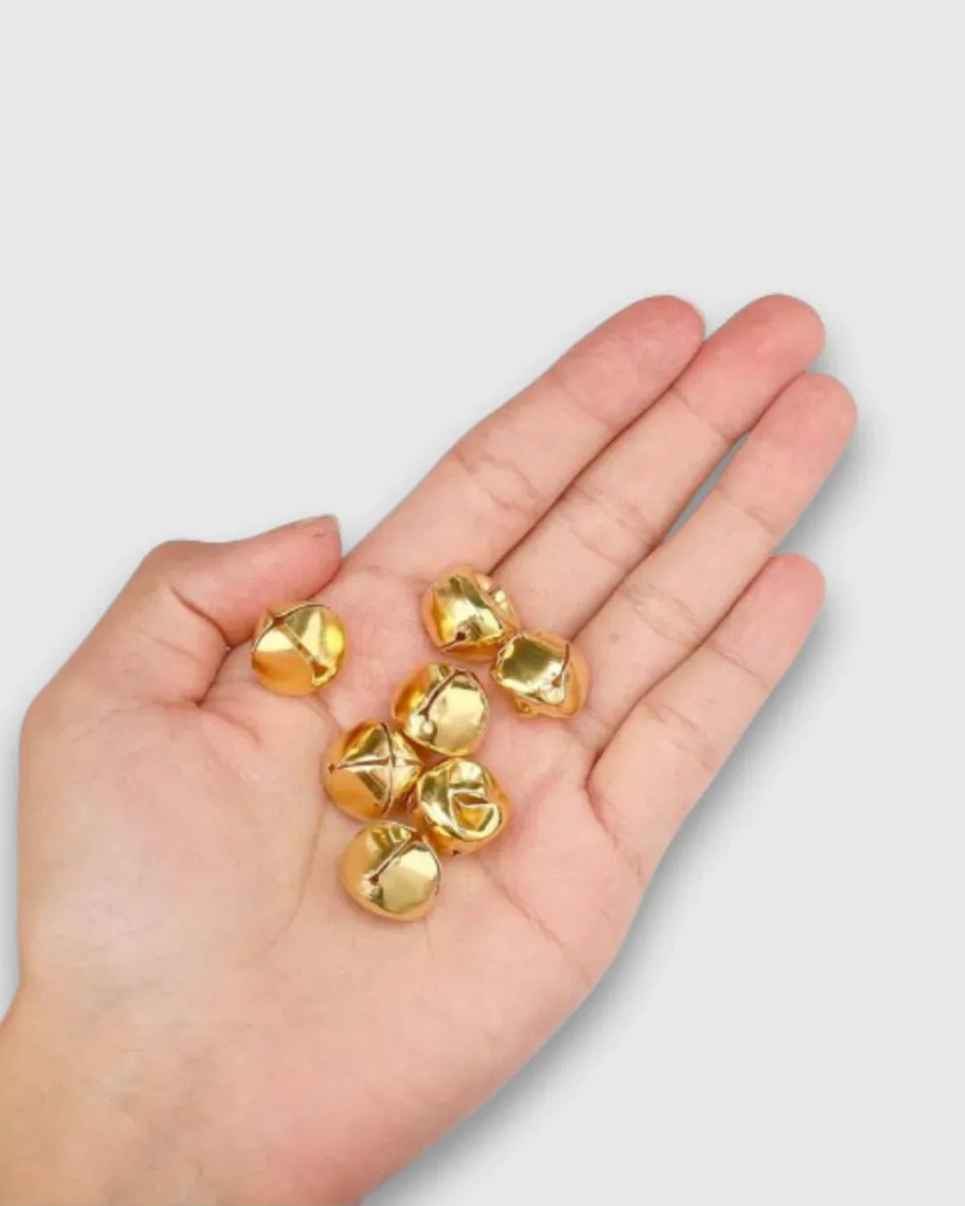 25 cascabeles dorados de 10 mm